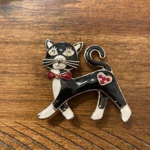 Elegant Cat Brooch with Red Bow Tie